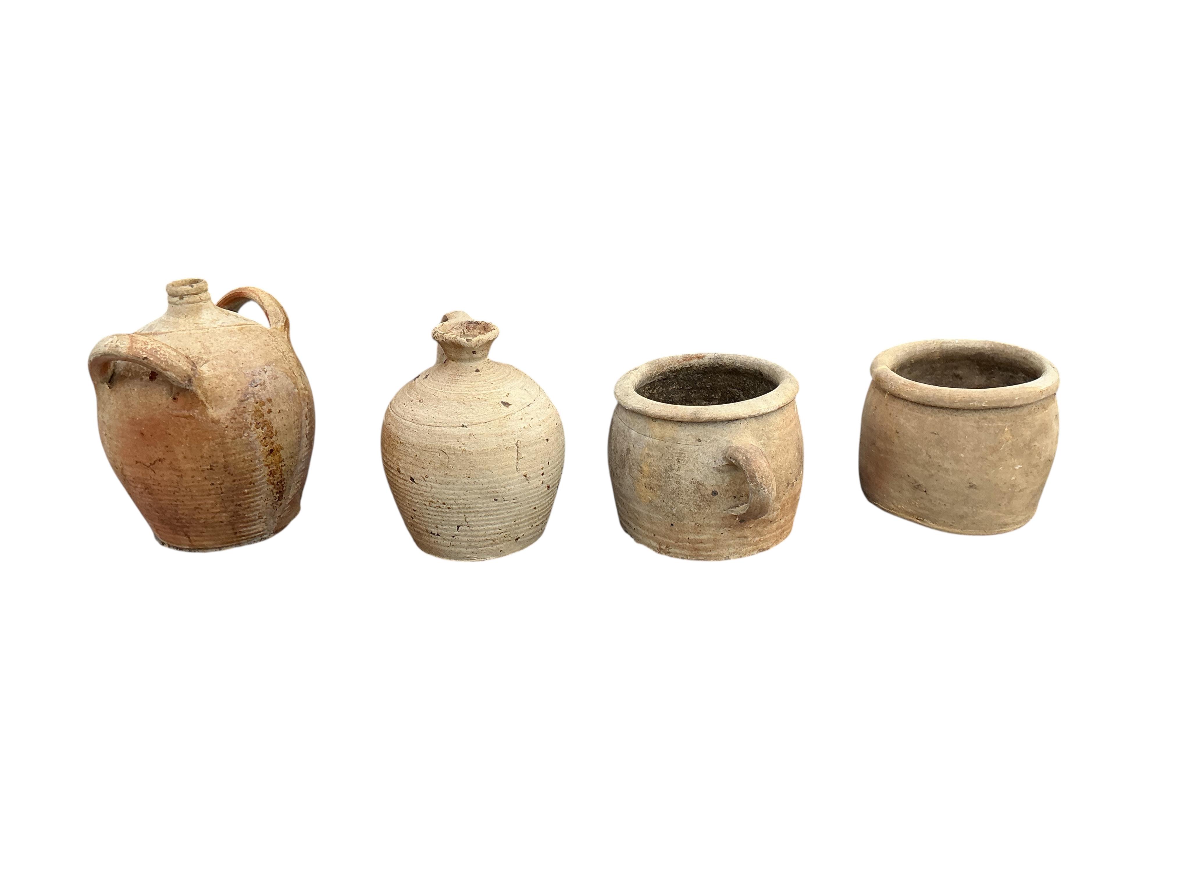Eight assorted earthenware vessels, largest height 40cm